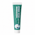 A tube of Gyan Veda Tooth Paste on a solid white background. The tube is teal green with white text and graphics, featuring a white cap.