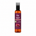 A bottle of Gyan & Vida Onion Hair Oil with an amber-colored liquid inside, a dark purple label featuring red onions, and a black multi-prong applicator cap, shown on a plain white background.