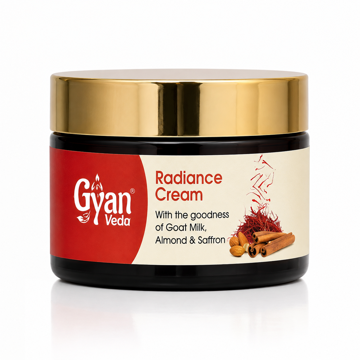 A jar of Gyan Veda Radiance Cream with a shiny gold lid, black container, and a label featuring red and cream sections with product details and illustrations of spices.