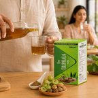 Adult measuring a dose of Gyan Triphala Kadha next to the product box and natural Ayurvedic ingredients